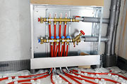Installation of an underfloor radiant heating and cooling system