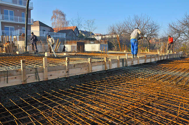 Starting pouring concrete on the slab
