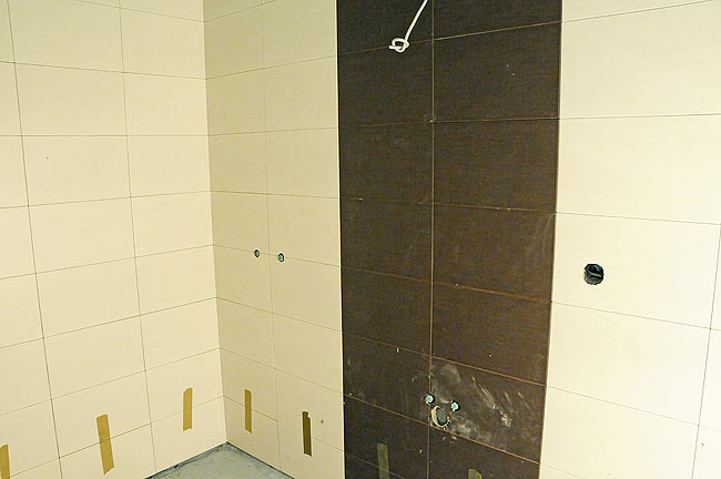 Bathroom tiles being installed