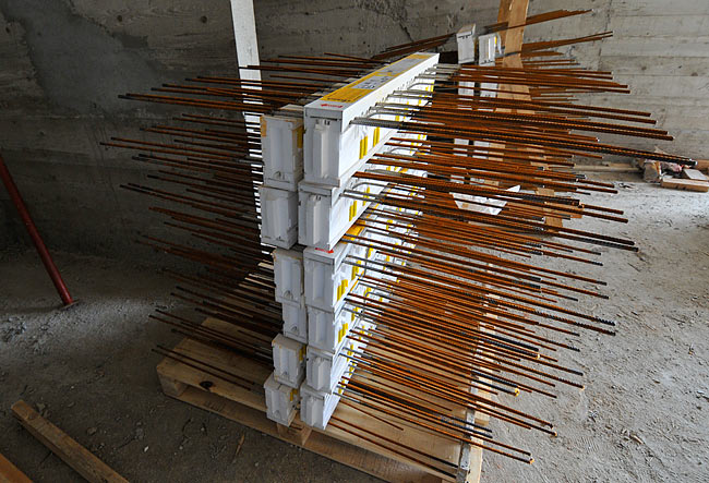 Stacks of Schöck Isokorb elements, ready to be installed