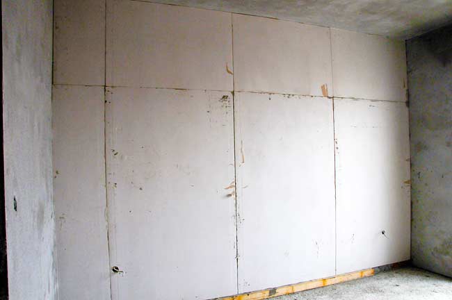 Gypsum boards just glued on the wall