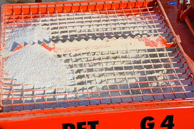 Closeup on Baumit ThermoExtra mortar in the mixing pump