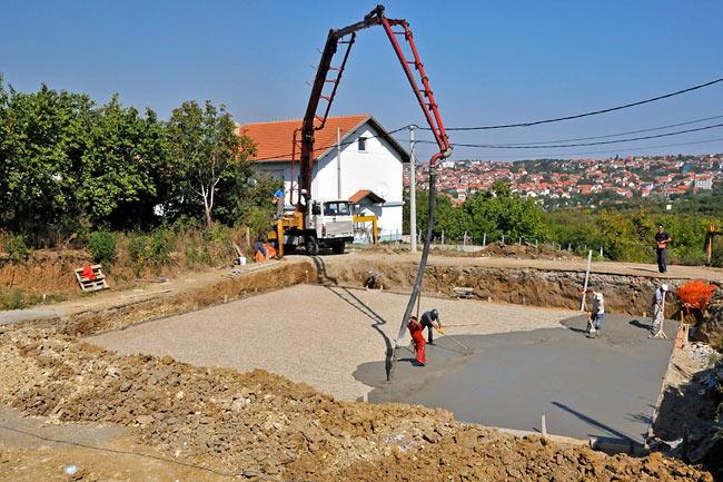 Pouring concrete on the footer slab - 1