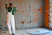 Finishing the interior walls with cement plaster